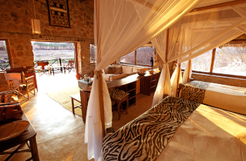 The sun streaming into your luxury chalet at Ruaha River Lodge