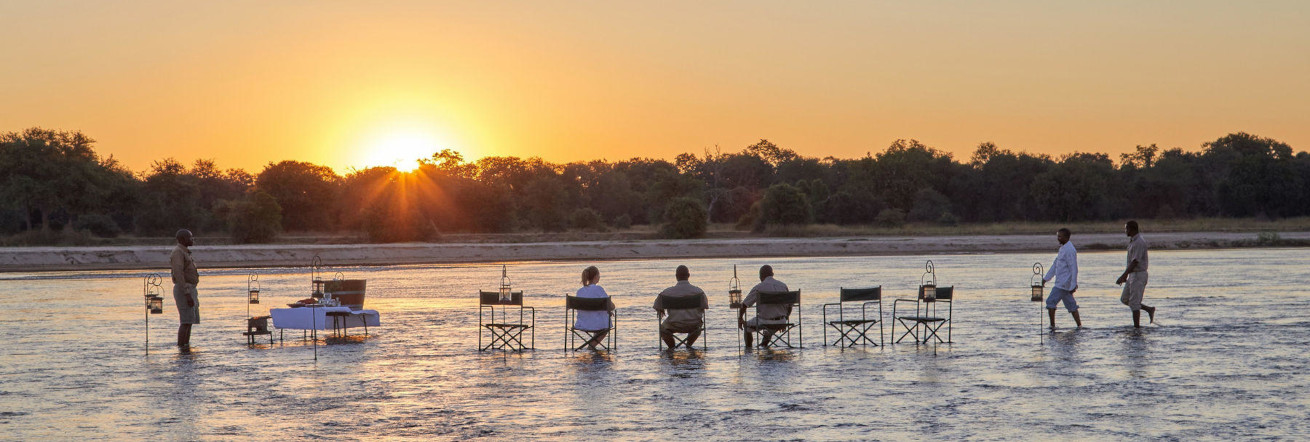 Sundowners in the Kapamba River, Kapamba Bushcamp