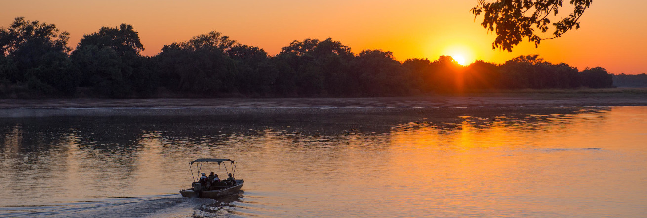 Sunset river cruise on the Luangwa River, Nkwali Camp