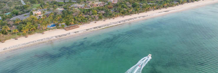 Boat cruises along the coastline