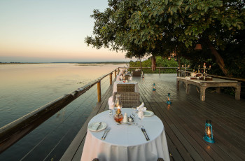 Dine overlooking the Chobe River at Chobe Game Lodge