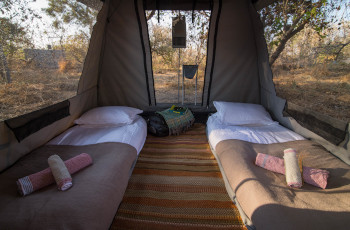 Dome tents at Kweene River Camp with cosy bedrolls