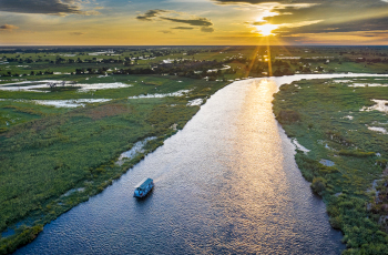 The Okavango Spirit meandering through the waterways of the Okavango Panhandle
