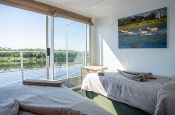 Cosy and comfortable rooms aboard the Okavango Spirit Houseboat