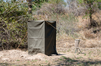  Pit latrine toilets and bucket showers at your mobile camp