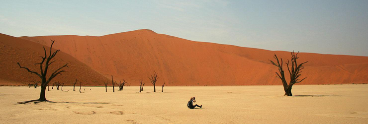 Marvel at the famous red dunes of Namibia