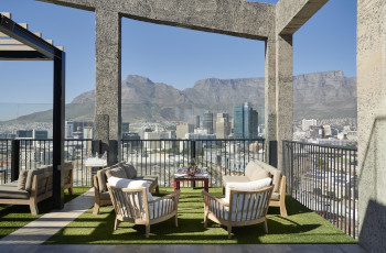 Enjoy panoramic views of Cape Town from the rooftop bar at the Silo Hotel