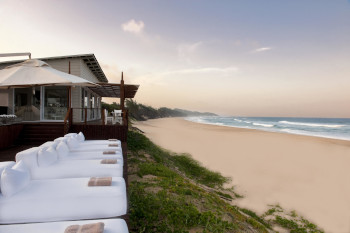 Sun deck over the ocean at White Pearl