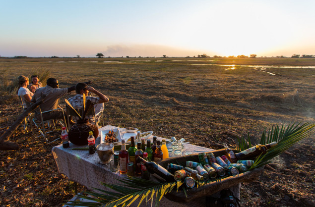 Sundowners on the floodplain, Wilderness Shumba Camp