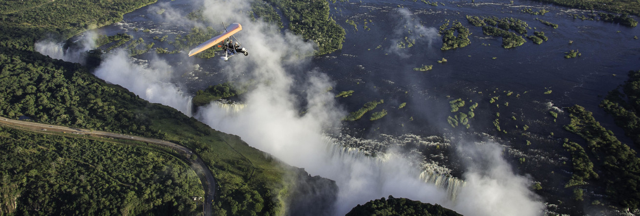 A thrilling microlight flight over the falls, Avani Victoria Falls Resort