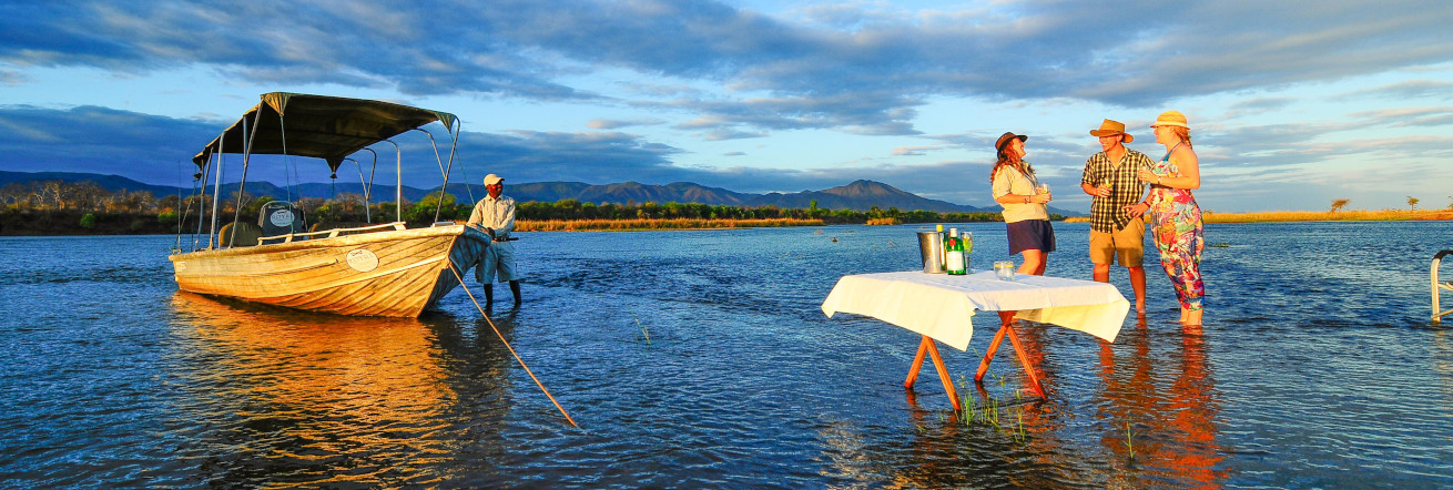 Sundowners on the banks of the Zambezi River, Royal Zambezi Lodge