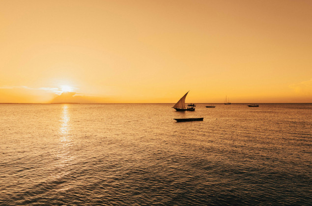 Sunset dhow cruise on the calm ocean waters