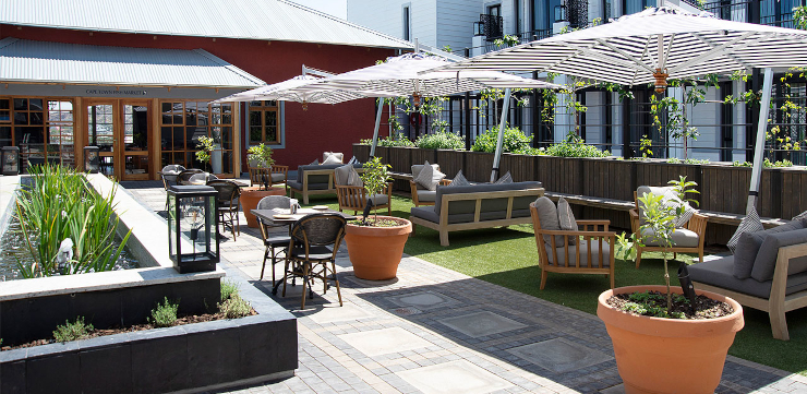 Relax on the terrace at the Weinberg hotel after your flight