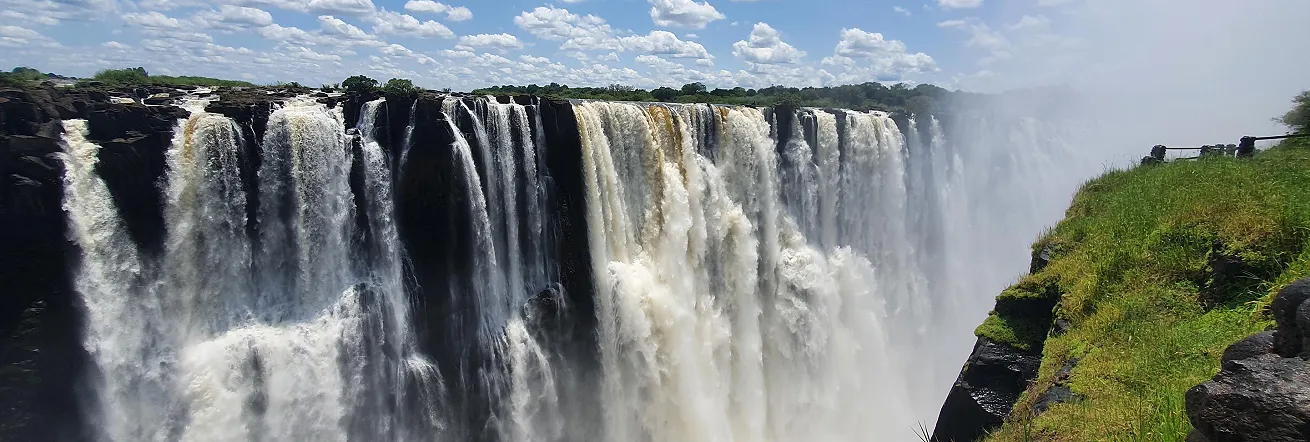 The Victoria Falls sits between Zambia & Zimbabwe