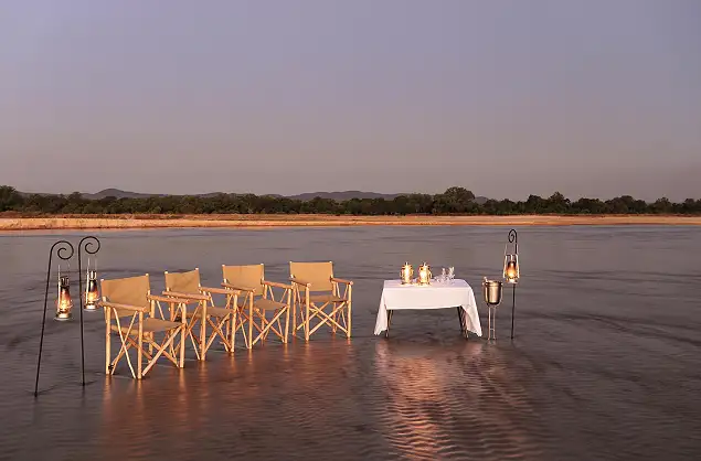 Sundowners set up in the Kapamba River, Zambia