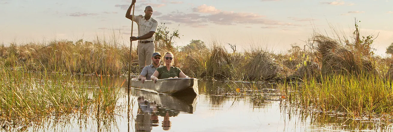 A mokoro trip on the crystal clear waters of the Okavango Delta, Botswana
