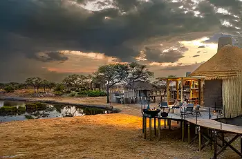 Views directly over the waterhole, Onguma Camp Kala