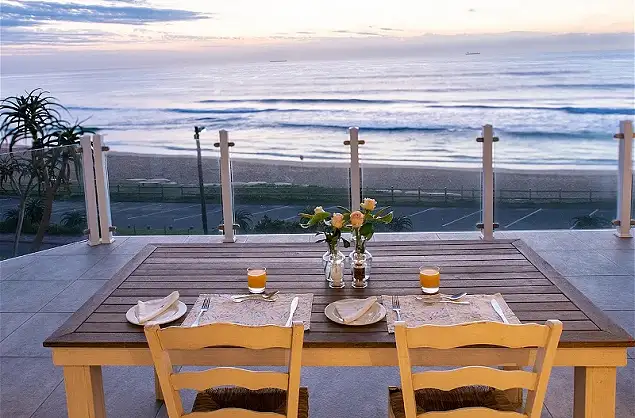 Breakfast overlooking the ocean at Fairlight Beach House