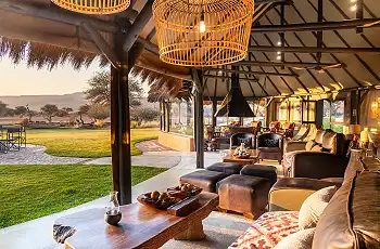 Relax in the lounge area at Okonjima Luxury Bush Camp