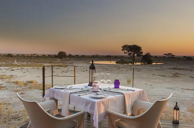 Dinner overlooking the waterhole, Onguma The Fort