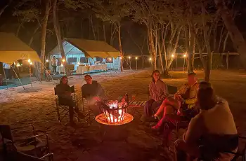 Dinner around the campfire at Kennedy Camp