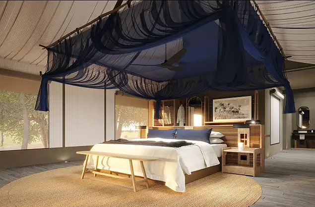 Tented suite interior at Xugana Island Lodge