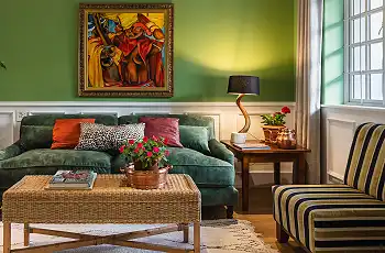 Comfortable lounge area in the African Romance suite, Nicol Street Heritage Cottages