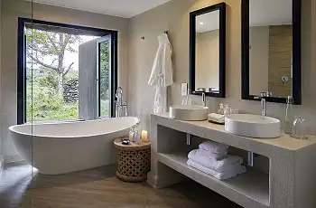 A bath with a view of the bush