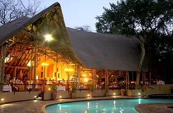 Relax in the pool after a game drive, Chobe Safari Lodge