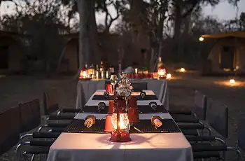 Dine under the African skies at Kweene River Camp
