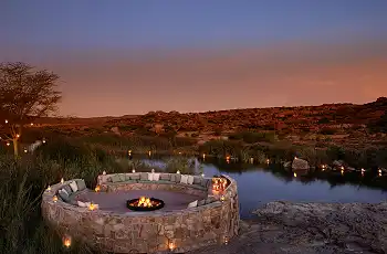 Sundowners with a spectacular view over the mountains and Karoo