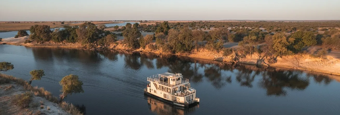 The Chobe Princess glides up the Chobe River, Botswana