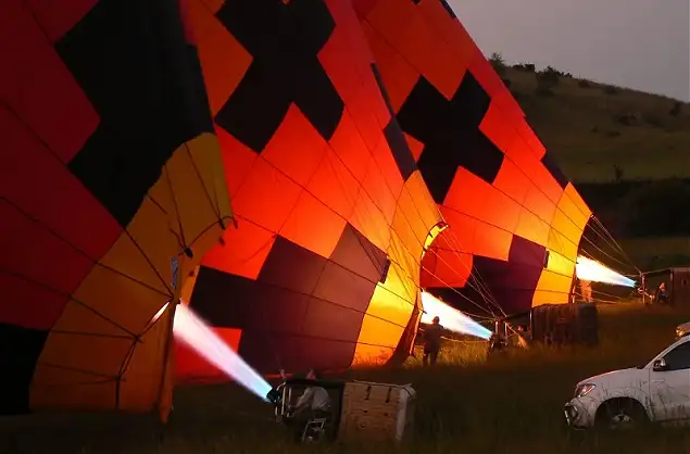 Getting the balloons ready just before sunrise
