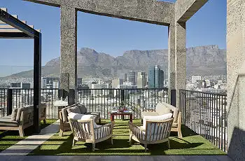 Enjoy panoramic views of Cape Town from the rooftop bar at the Silo Hotel