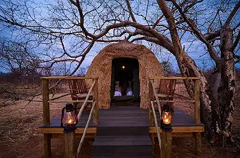Accommodation is in cozy dome tents on raised platforms at Tsodilo Hills