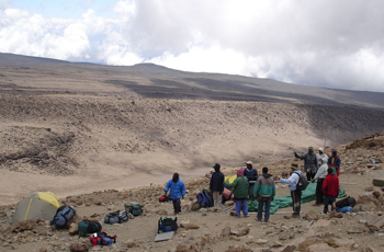 Porters assist in setting up camp sites