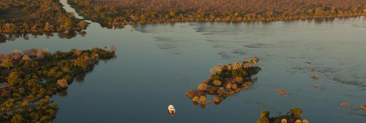 Sunset cruise on the upper Zambezi River above the Victoria Falls
