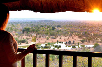Victoria Falls Safari Lodge overlooks a waterhole