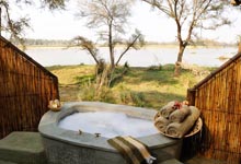Old Mondoro, bath overlooking Zambezi River, Zambia